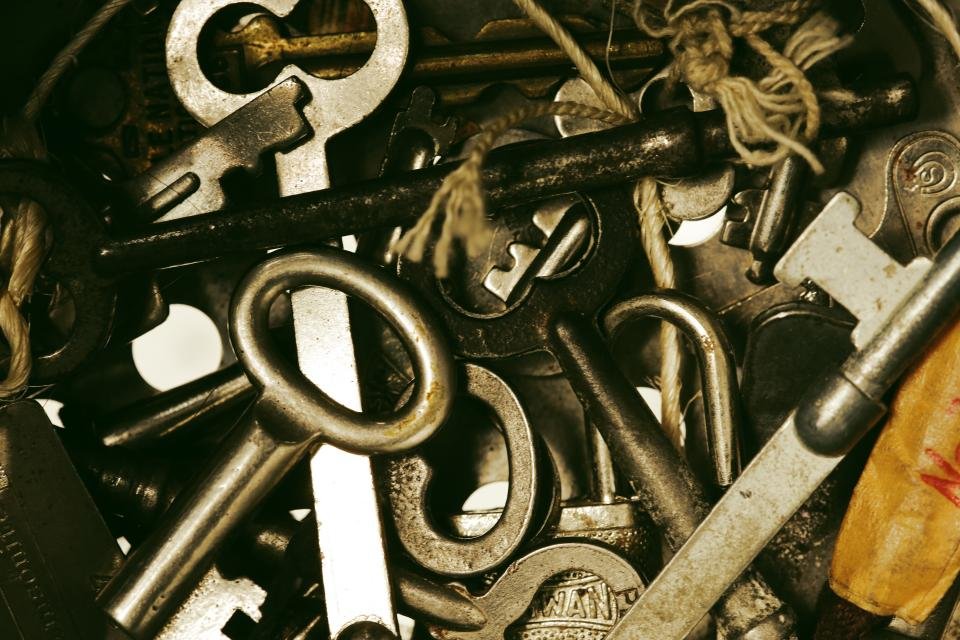 Keys and padlocks on a workbench